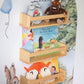 Peter Rabbit themed bookshelf with a personal decal